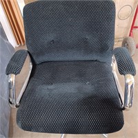 Unknown brand of chair swivel on wheels armrest