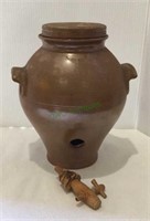 Crockery vinegar jar with cork and wooden spout.