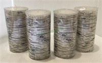 Set of four holiday birch themed pillar candles