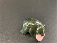 Alaskan Kobuk jade carved bear who has caught a la