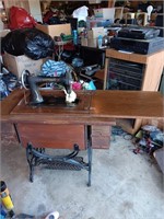 Vintage sewing machine with cabinet