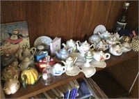 Collection of porcelain teapots, etc.