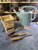 Garden tools blue watering can handspreader