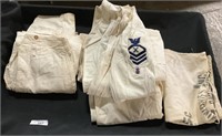 Pair of Navy Uniforms, Adv Reading Laundry Bag.
