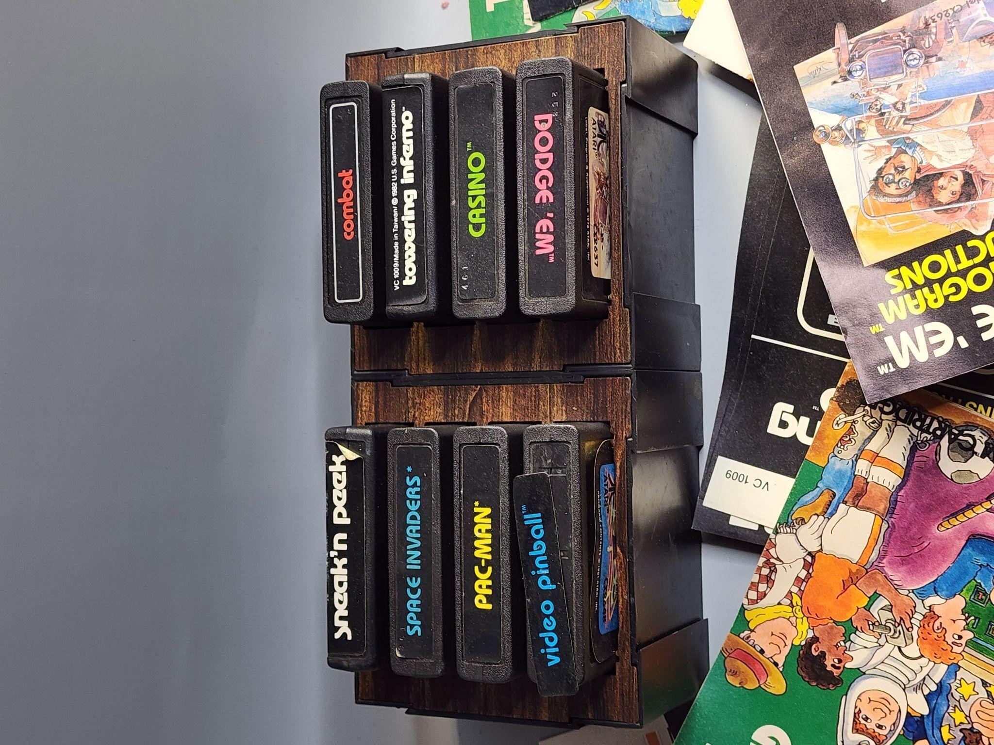 8 Atari games with holder and books