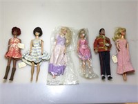 Assorted Barbies and more. Dolls