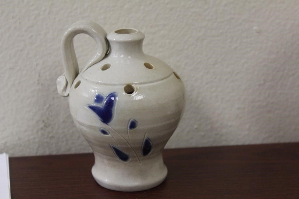 A Small Stonewear Flow Blue Ewer