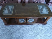Wooden coffee table and two end tables with doors
