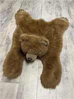 Adorable little teddy bear skinned rug