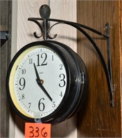Two sided outdoor mounted clock/temp gauge