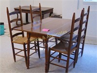 Small wood kitchen table with four chairs