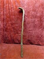 Old folk art carved walking stick cane.