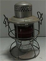 Railroad lantern with red lens and marking