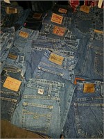 25 assorted pairs of blue jean pants, shorts and
