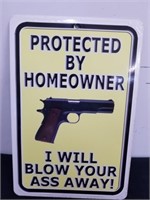 Eight x 12-in metal protected by homeowner sign