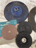 assortment of grinding disc and brushes