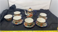 Poppy Seed pattern Tea pot cups saucers some