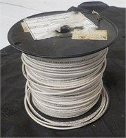 Roll of 12 gauge wire. Length unknown.