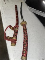 SWORD WITH RED SHEATH