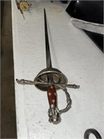 SWORD WITH MAN ON HANDLE