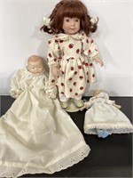 Trio of vintage porcelain dolls