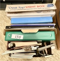 Box of notebooks and binders, light box