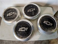 4 vintage Chevrolet aluminum hubcaps