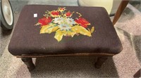 Small vintage footstool with a floral