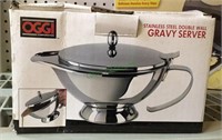 Stainless steel double wall gravy server.   1922