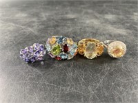 4 Beautiful sterling silver rings with some precio