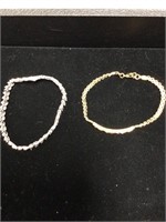 (2) bracelets, 1 silver 2ct, 1 gold with