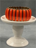 Arpeggio stamped vino orange color Bracelet.