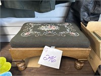 Small embroidered stool