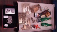 Advertising keychains and belt buckles, vintage