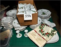 Lovely 20 pc table setting of holiday dishes.