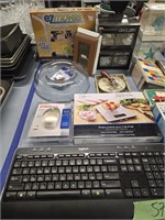 Keyboard, digital scales kitchen items as shown