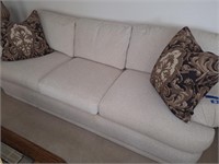 WHITE UPHOLSTERED COUCH & PILLOWS