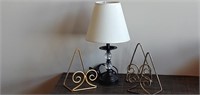 Black metal and glass lamp with paper shade,