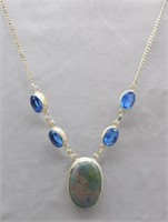 Sterling Silver necklace with blue stones.
