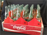 Enjoy Coca Cola red case with 24 bottles 16 oz.