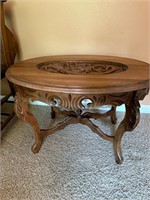 ornate coffee table with removable glass top