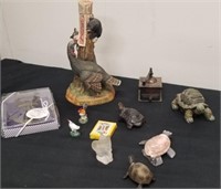 Group of collectible Stone Turtles with miniature