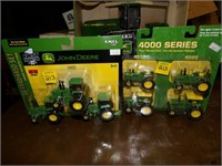 2-J.D. 1/64th Tractor sets