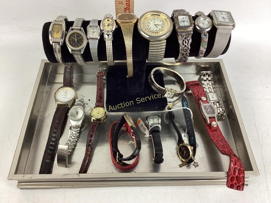 wrist watches In silver tray