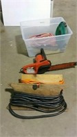 Homelite electric chainsaw and extension cords