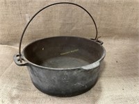 Antique cast iron cooking pot