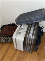 Mismatched vintage luggage