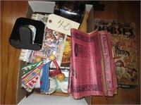 assortment of misc items, books, cups