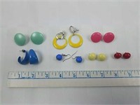 7 sets of brightly colored groovy earrings