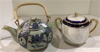 Combined lot includes a smaller ceramic teapot